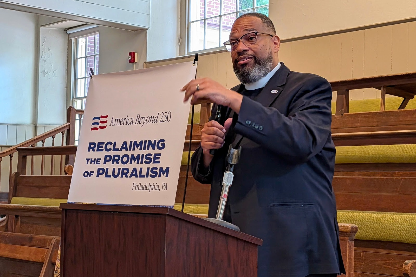Bishop Dwayne Royster, Executive Director of Faith in Action, delivered opening remarks.